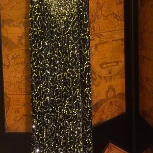 Gorgeous beaded black long sleeveless Eve Gown